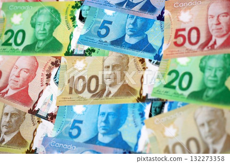 Canadian Dollar currency money bills. CAD currency banknotes in big bunch with different denomination close up Canadian Dollar currency money bills. CAD currency banknotes in big bunch with different denomination close up 132273358