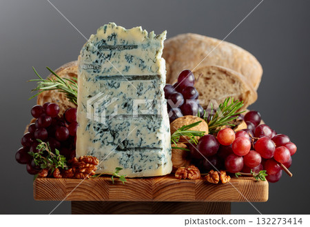 Gorgonzola cheese with ciabatta, walnuts, grapes, and aromatic herbs. Gorgonzola cheese with ciabatta, walnuts, grapes, and aromatic herbs. 132273414