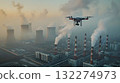 A drone is capturing smoke emissions from a power plant in the sky 132274973