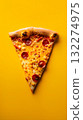 Pepperoni Pizza on a yellow background is a quick, delicious snack 132274975