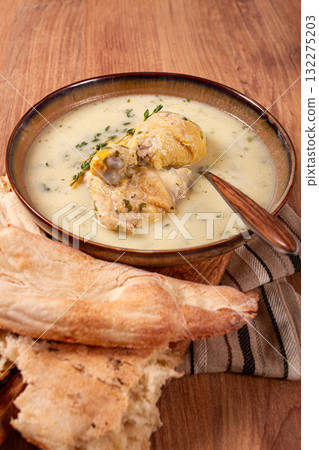 Chikhirtma chicken soup, Georgian dish, with lavash, top view, no people, Chikhirtma chicken soup, Georgian dish, with lavash, top view, no people, 132275203