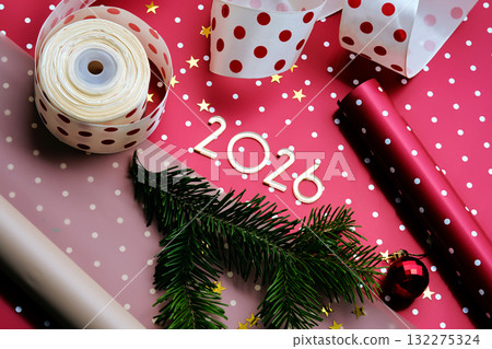 New Year 2026 red background. Number of the coming year in Christmas decoration. New Year 2026 red background. Number of the coming year in Christmas decoration. 132275324