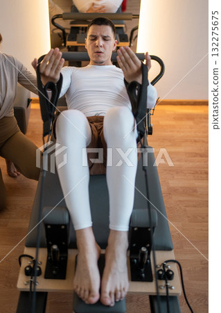 Join a Pilates session with specialized equipment and skilled instructors for great results Join a Pilates session with specialized equipment and skilled instructors for great results 132275675