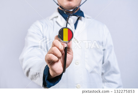 Doctor hands holding stethoscope with Belgium flag. Belgium health and care concept 132275853