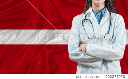 Medical professional on Latvia flag. Healthcare and wellness in Latvia, Concept 132275950