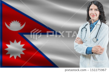 Nepali medicine and healthcare concept. Close up of doctor against Nepal flag background 132275967