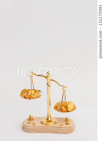 Beautiful Golden Balance Scales with little pieces of gold. Gold cost climbing up. Finance, gold theme Beautiful Golden Balance Scales with little pieces of gold. Gold cost climbing up. Finance, gold theme 132275991