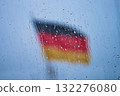 German Flag behind glass with raindrops 132276080