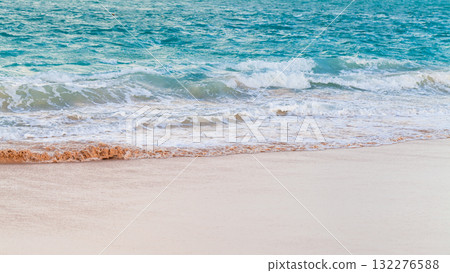 A serene seaside image featuring turquoise ocean water and sand A serene seaside image featuring turquoise ocean water and sand 132276588