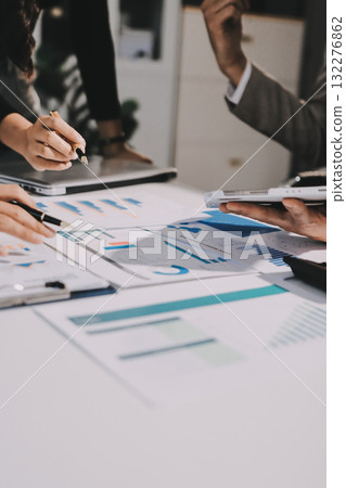 Accounting company provide finance and taxation planning for profitable cash flow, Auditor and accountant team working in office, analyze financial data and accounting record with calculator.Insight 132276862