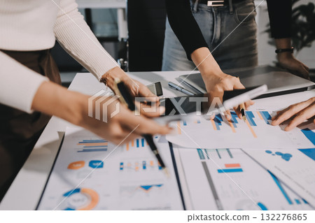 Accounting company provide finance and taxation planning for profitable cash flow, Auditor and accountant team working in office, analyze financial data and accounting record with calculator.Insight Accounting company provide finance and taxation planning for profitable cash flow, Auditor and accountant team working in office, analyze financial data and accounting record with calculator.Insight 132276865