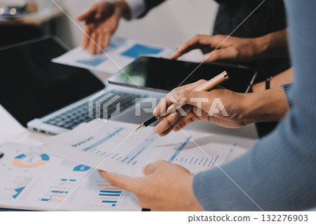 Accounting company provide finance and taxation planning for profitable cash flow, Auditor and accountant team working in office, analyze financial data and accounting record with calculator.Insight 132276903