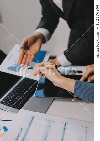 Accounting company provide finance and taxation planning for profitable cash flow, Auditor and accountant team working in office, analyze financial data and accounting record with calculator.Insight Accounting company provide finance and taxation planning for profitable cash flow, Auditor and accountant team working in office, analyze financial data and accounting record with calculator.Insight 132276904