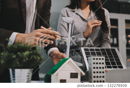 Group of businesspeople in team brainstorm meeting discussion on ESG (Environmental, social, corporate governance) organization planning. Sustainable business, coworker people teamwork. Close up 132276930