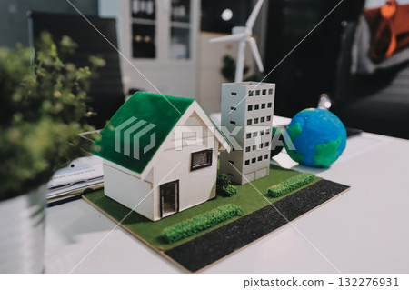 Group of businesspeople in team brainstorm meeting discussion on ESG (Environmental, social, corporate governance) organization planning. Sustainable business, coworker people teamwork. Close up Group of businesspeople in team brainstorm meeting discussion on ESG (Environmental, social, corporate governance) organization planning. Sustainable business, coworker people teamwork. Close up 132276931