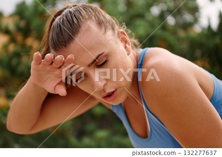 Woman Resting After Intense Run 132277637