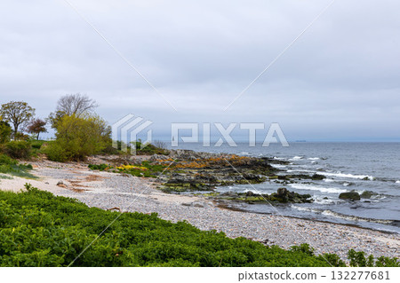 Sea sandy beach in cloudy weather. Seascape Sea sandy beach in cloudy weather. Seascape 132277681