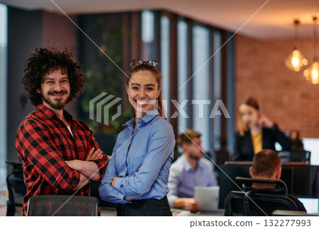 Corporate Collaboration: European Blonde Businesswoman and Colleague Standing in Modern Office Corporate Collaboration: European Blonde Businesswoman and Colleague Standing in Modern Office 132277993