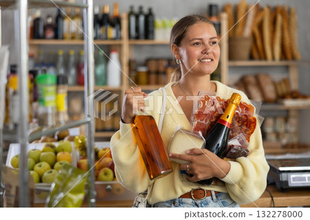 Young woman with food and champagne Young woman with food and champagne 132278000