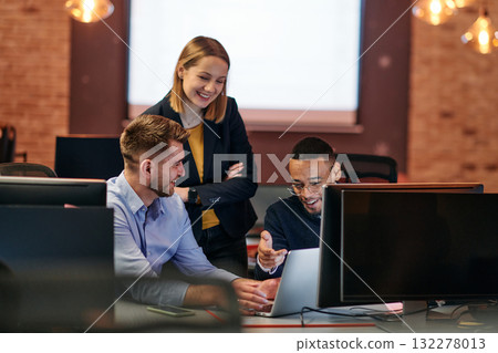 Strategic Business Meeting: Group of Professionals Collaborating in Office Using Computers 132278013