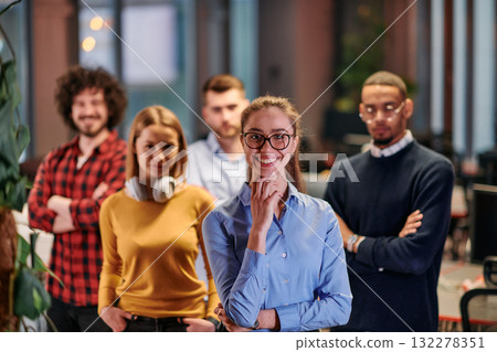 Portrait of successful creative business team looking at camera and smiling. Diverse business people standing together at startup. Selective focus  132278351