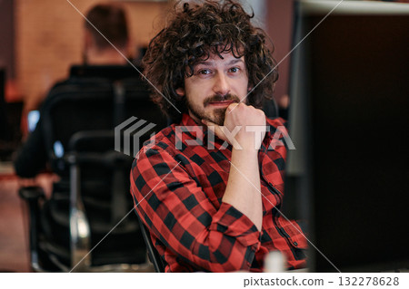 Focused Programmer With Afro Hairstyle in Plaid Shirt Working on Computer in Office Environment Focused Programmer With Afro Hairstyle in Plaid Shirt Working on Computer in Office Environment 132278628
