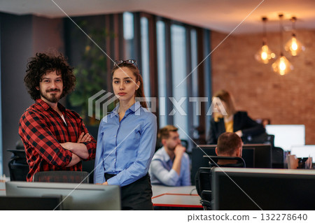 Strategic Business Meeting: Group of Professionals Collaborating in Office Using Computers 132278640