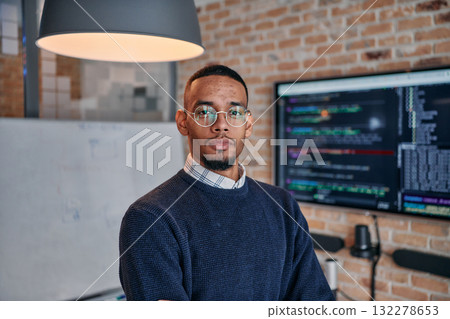 Startup Leadership: African American Businessman in Modern Office with Colleagues in Background. 132278653