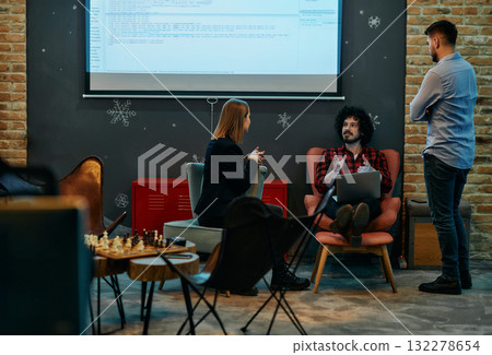 Office Colleagues Enjoying Break Time Together. 132278654