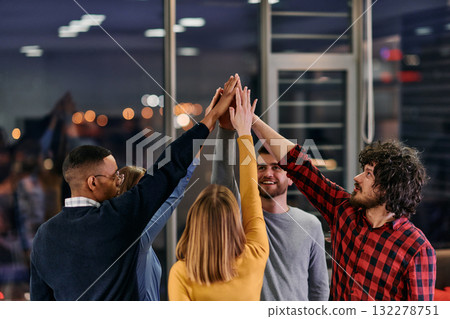 Overjoyed young multiethnic businesspeople have fun celebrate shared business success or victory in office. Smiling multiracial diverse employees feel excited win get good results. Teamwork concept Overjoyed young multiethnic businesspeople have fun celebrate shared business success or victory in office. Smiling multiracial diverse employees feel excited win get good results. Teamwork concept 132278751