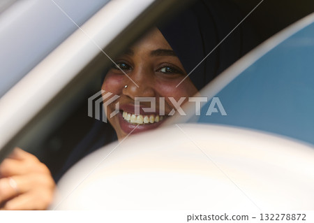 Middle Eastern Teenage Girl Driving Through Scenic Nature Middle Eastern Teenage Girl Driving Through Scenic Nature 132278872