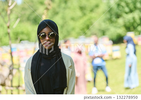 A Journey Through Nature's Beehives with an African American Muslim Woman 132278950