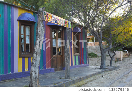 Picturesque typical construction in the town of Puerto Piramides, Peninsula Valdes, Chubut Province, Patagonia, Argentina. Picturesque typical construction in the town of Puerto Piramides, Peninsula Valdes, Chubut Province, Patagonia, Argentina. 132279346