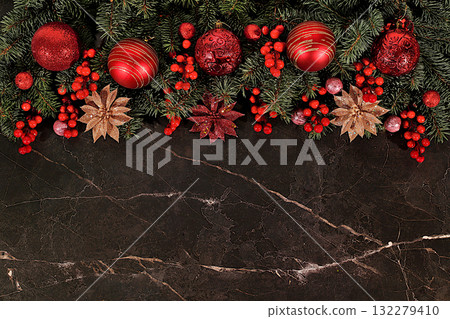Festive winter greeting card and banner on the screen, Beautiful Christmas and New Year background with lights, decorations, toys and live fir branches, product design for holiday advertising, 132279410
