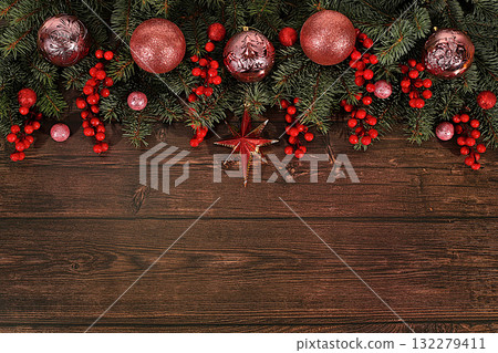Festive winter greeting card and banner on the screen, Beautiful Christmas and New Year background with lights, decorations, toys and live fir branches, product design for holiday advertising, 132279411