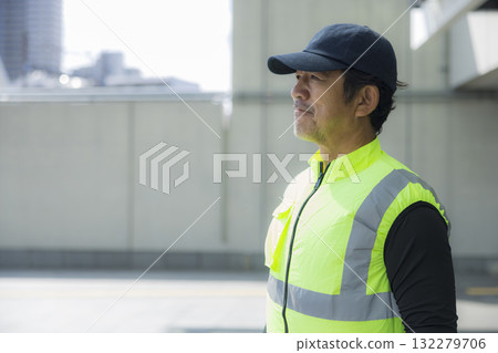 Security guards directing people through the event space Security guards directing people through the event space 132279706