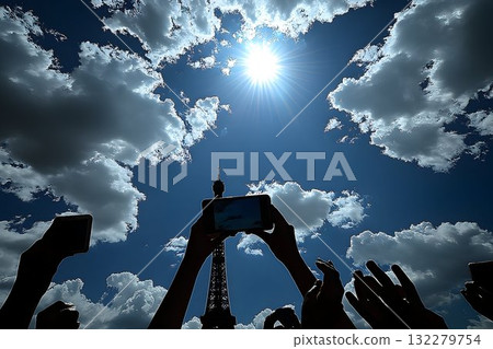 Eiffel Tower captured through a phone screen against a bright su Eiffel Tower captured through a phone screen against a bright su 132279754