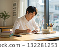 Male businessman writing in notebook / Image of studying, organizing ideas, working from home 132281253