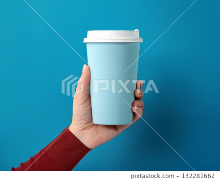 Hand holding a takeaway cup Hand holding a takeaway cup 132281662