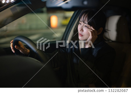 A woman driving a car A woman driving a car 132282087