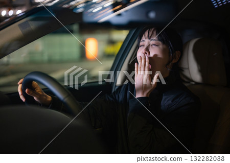 A woman driving a car A woman driving a car 132282088