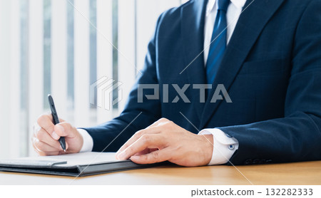businessman signing documents businessman signing documents 132282333