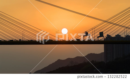 Oct 7 2025 Sunset Over Bridge With Silhouetted Bus, Cables, And Industrial Structures Oct 7 2025 Sunset Over Bridge With Silhouetted Bus, Cables, And Industrial Structures 132282522