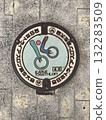 Manhole embedded in the road 132283509