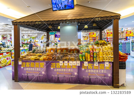 Inside Big C supermarket aisles shelves full of products Thailand. 132283589