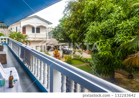 Apartment hotel building and huge tropical trees jungle nature Thailand. Apartment hotel building and huge tropical trees jungle nature Thailand. 132283642
