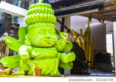 Green Banana plant tree man statue in Patong Phuket Thailand. 132283756