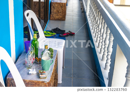 Table with beer coffee ashtray cigarettes the next morning Thailand. Table with beer coffee ashtray cigarettes the next morning Thailand. 132283760
