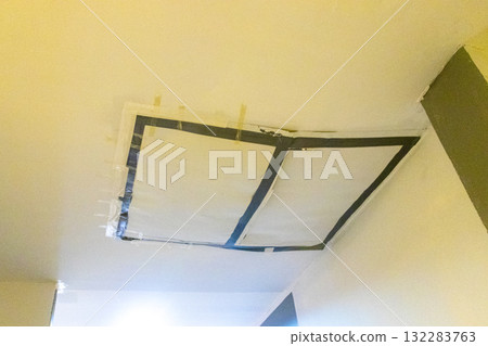 Hotel roof damp danger of collapse patched up Phuket Thailand. 132283763