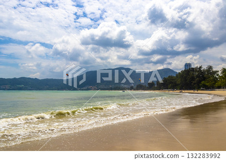 Patong Beach Phuket with turquoise blue water and sky Thailand. Patong Beach Phuket with turquoise blue water and sky Thailand. 132283992